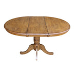 36 Round Pedestal Table with 12 Leaf in Pecan